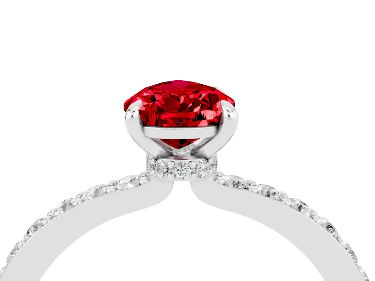Pear Cut Ruby Solitaire Engagement Ring with Pavé Band and Four-Prong Setting White gold