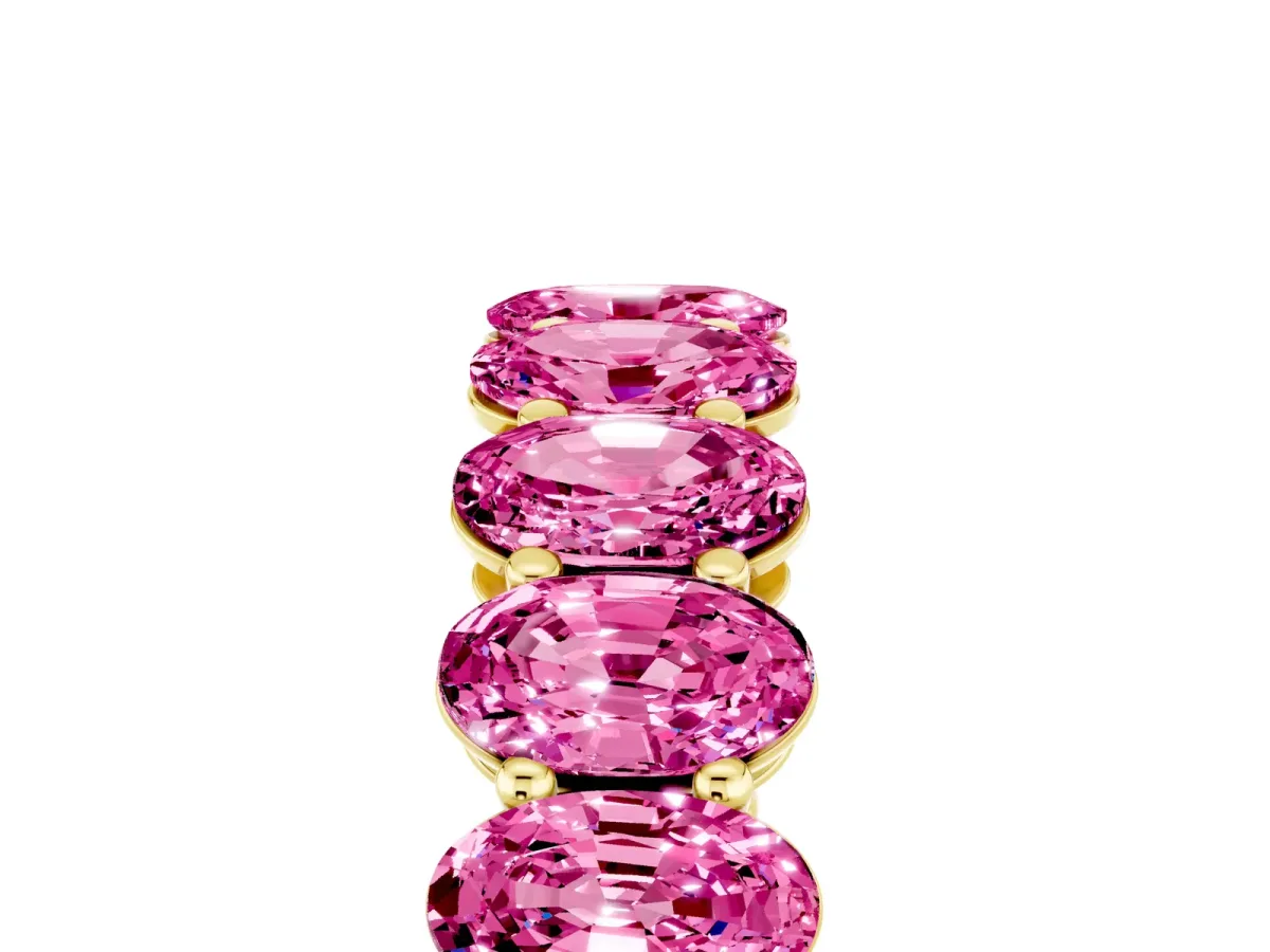 Oval Cut Pink Sapphire Eternity Band with Shared Prong Setting Yellow gold