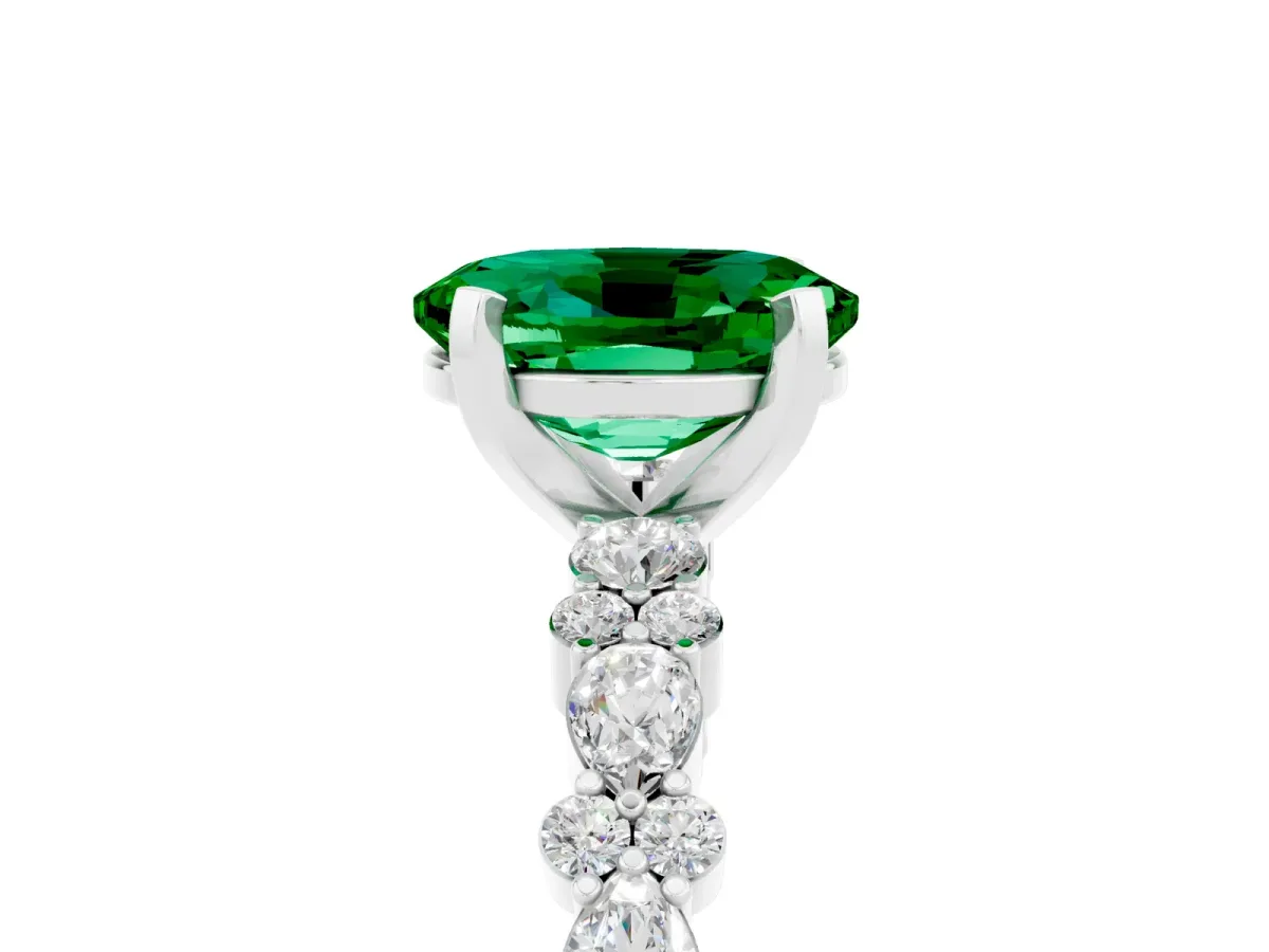 Oval Cut Emerald Side Stone Solitaire Ring with Round and Four-Prong Setting Platinum