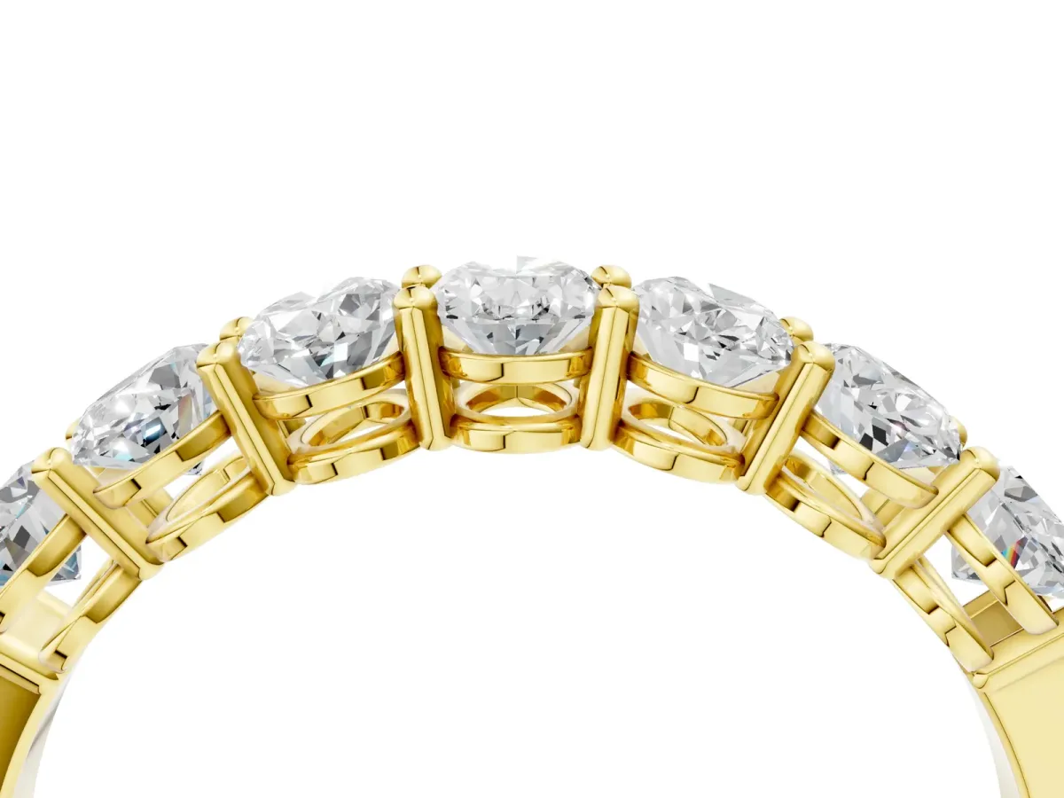 Oval Diamond Shared Prong Eternity Band Yellow gold