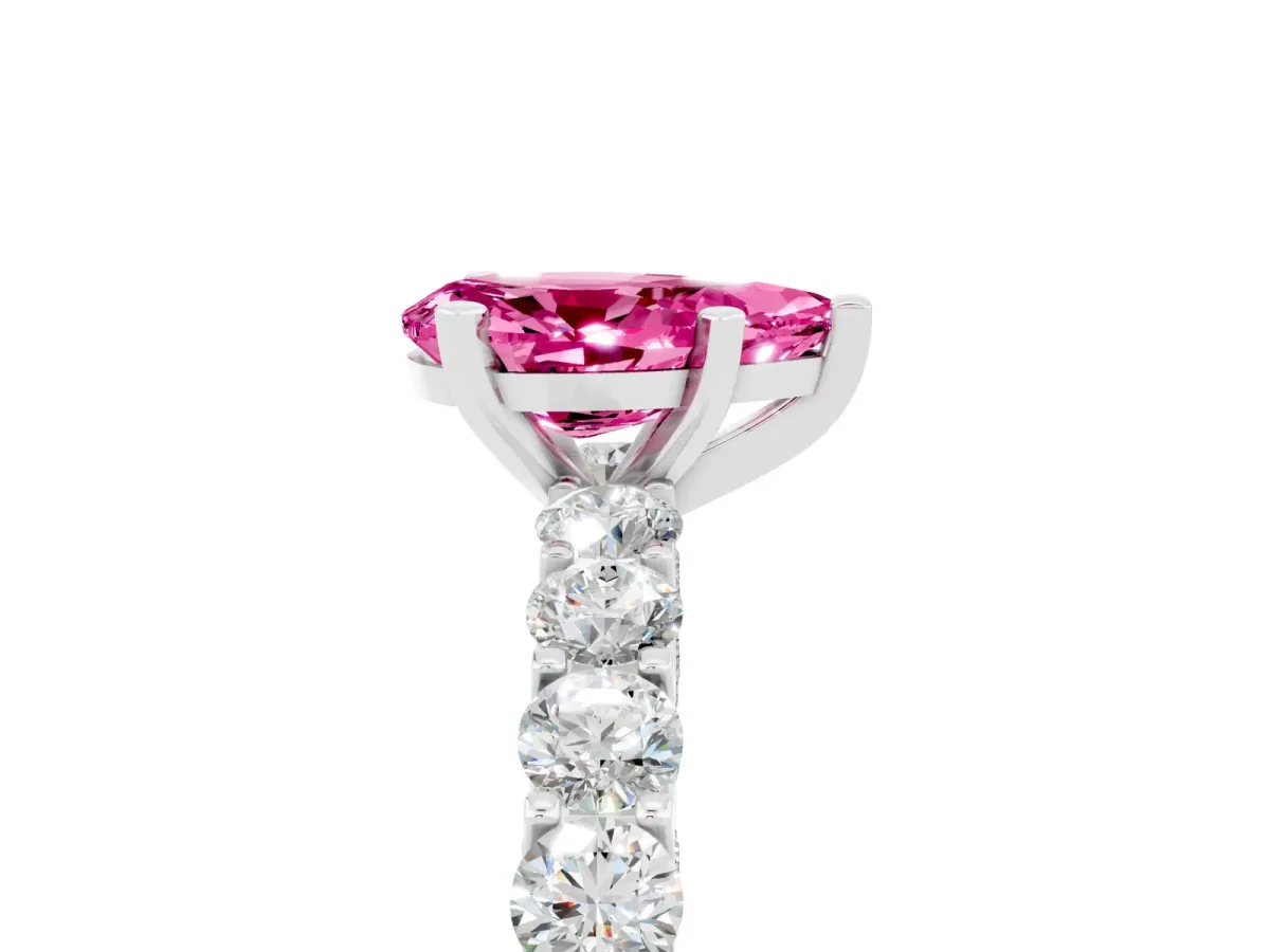 Pear Cut Pink Sapphire Solitaire Ring with Shared Prong Pavé Band and Four-Prong Setting Silver