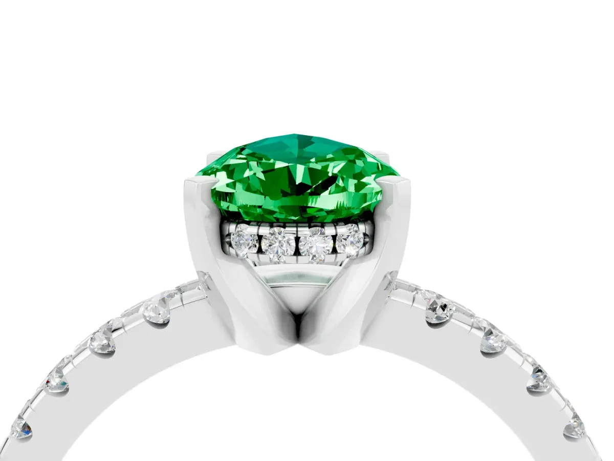 Pear Cut Emerald Solitaire Ring with Round Pavé Band and Four-Prong Setting Silver