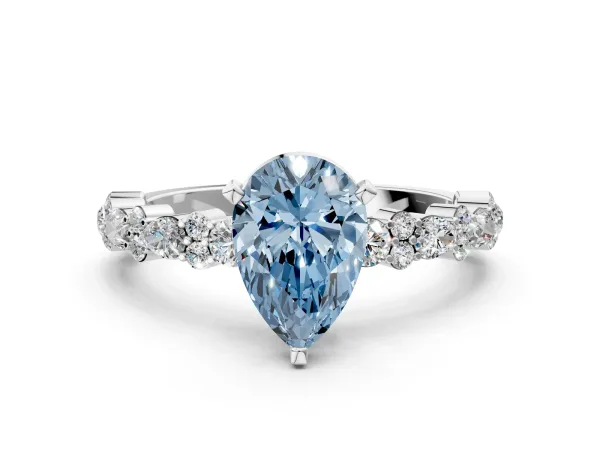 Fancy Blue Pear Cut Diamond Side Stone Solitaire Ring with Round and Four-Prong Setting White gold