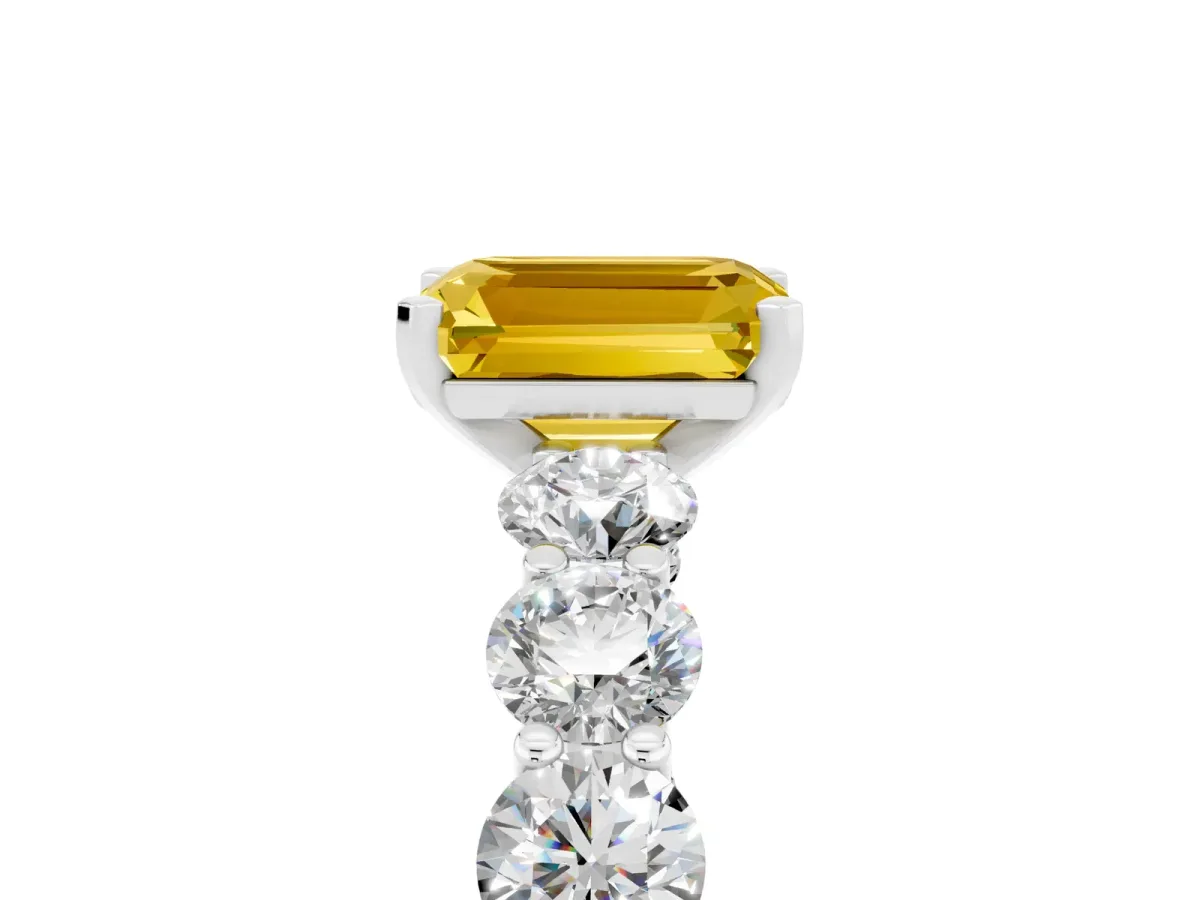 Emerald Cut Yellow Sapphire Prong Setting with Side Stones on a Pave Band Silver
