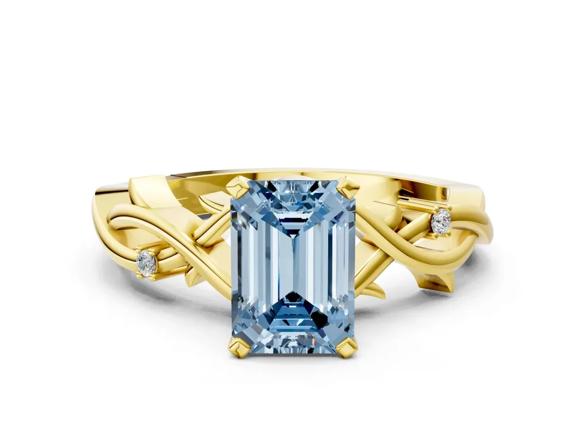 Fancy Blue Emerald Cut Diamond Solitaire Ring with Twisted Band and Prong Setting Yellow gold