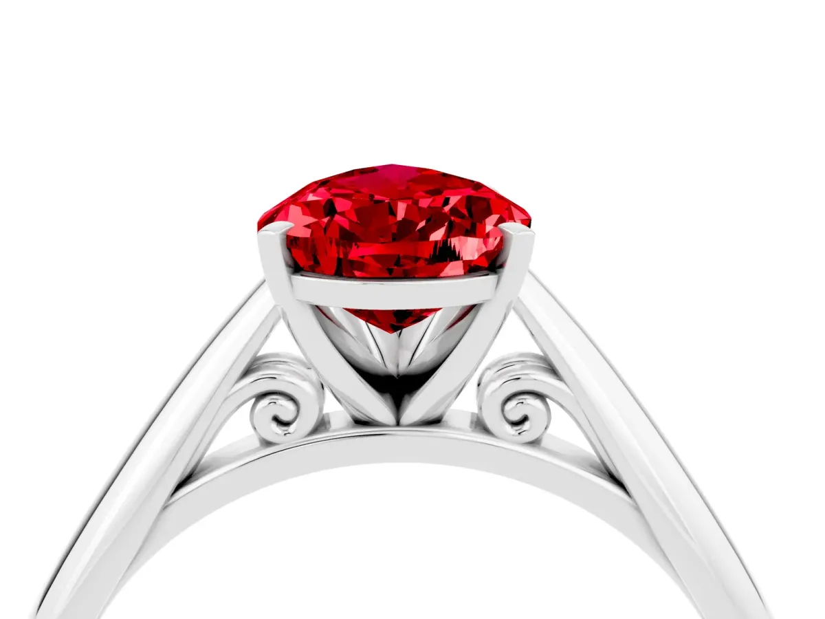 Pear Cut Ruby Solitaire Engagement Ring with Cathedral Setting and Four-Prong Mount White gold