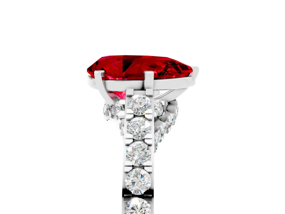 Pear Cut Ruby Solitaire Ring with Crossover Gallery and Round Pavé Band Platinum