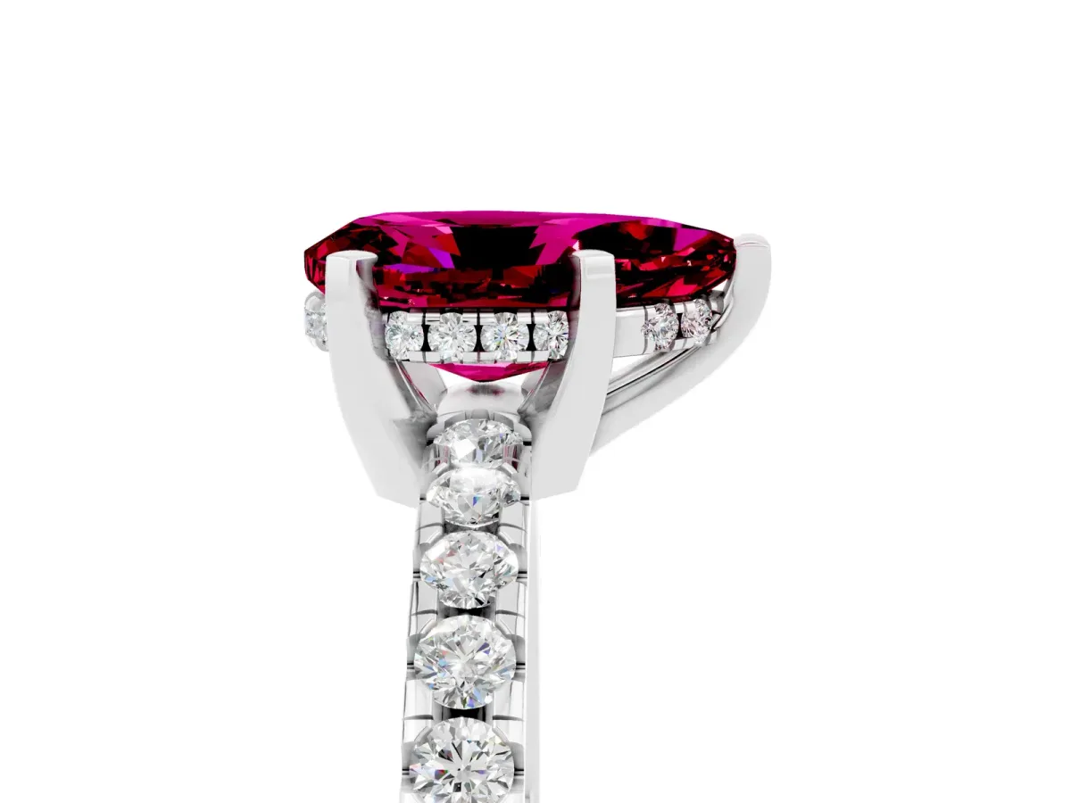 Pear Cut Garnet Solitaire Ring with Round Pavé Band and Four-Prong Setting Silver
