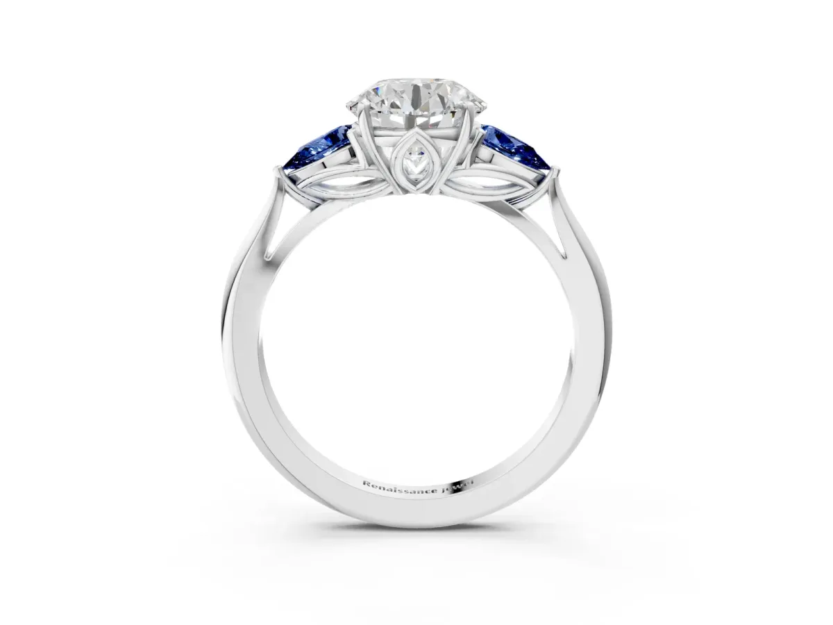 Round Cut Diamond Three-Stone Ring with Pear Blue Sapphire Side Stones and Prong Setting Silver