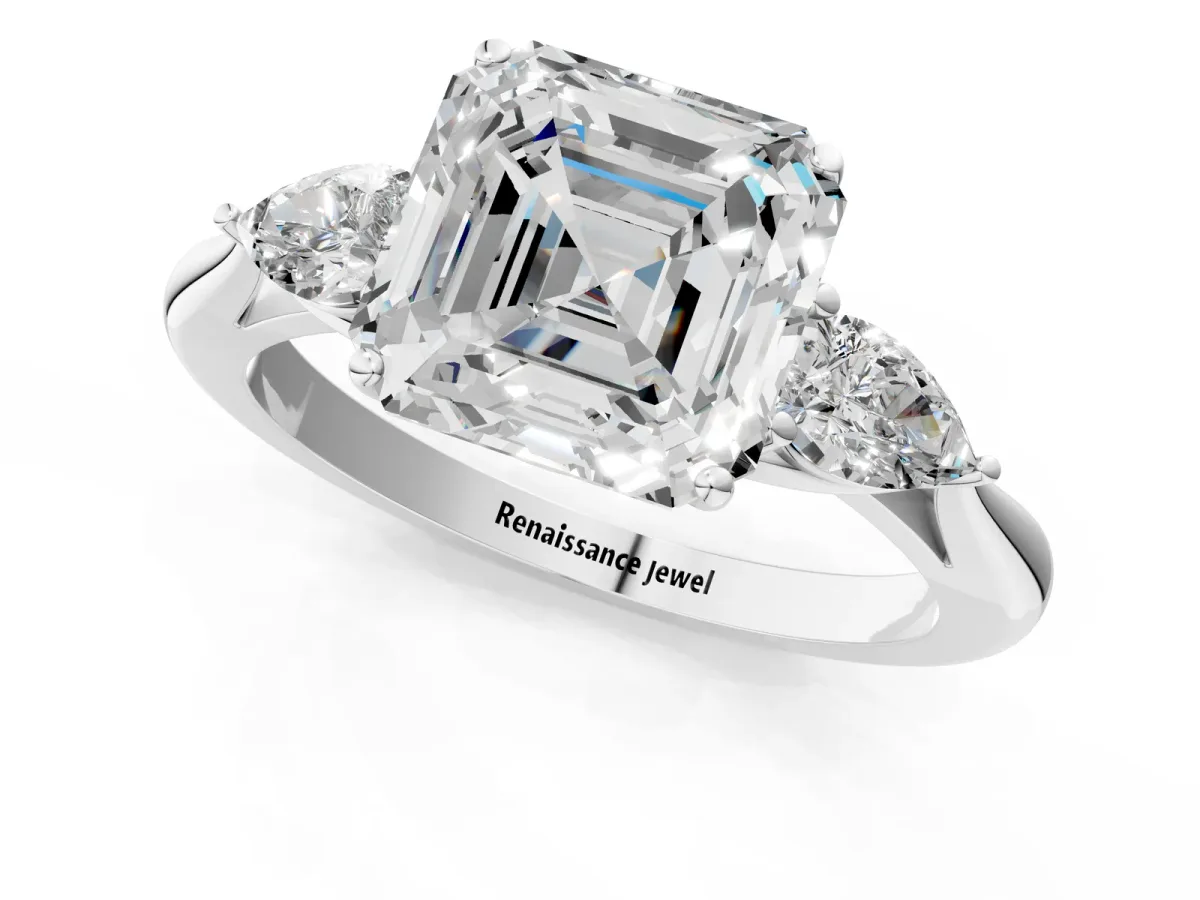 Three-Stone Asscher Cut Diamond Ring with Pear Side Stones in Four-Prong Setting Platinum