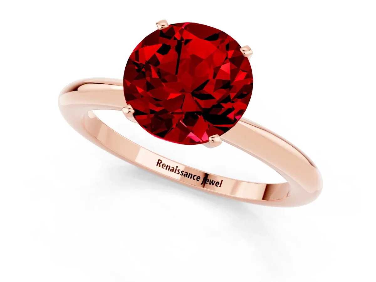 Round Cut Ruby Solitaire Ring with Six-Prong Setting and Classic Band Rose gold
