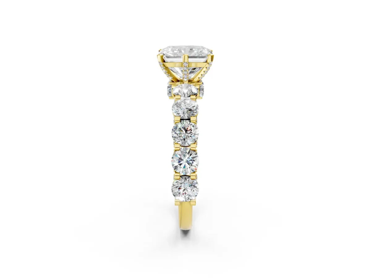 Radiant Cut Diamond Side Stone Engagement Ring with Four-Prong Setting Yellow gold