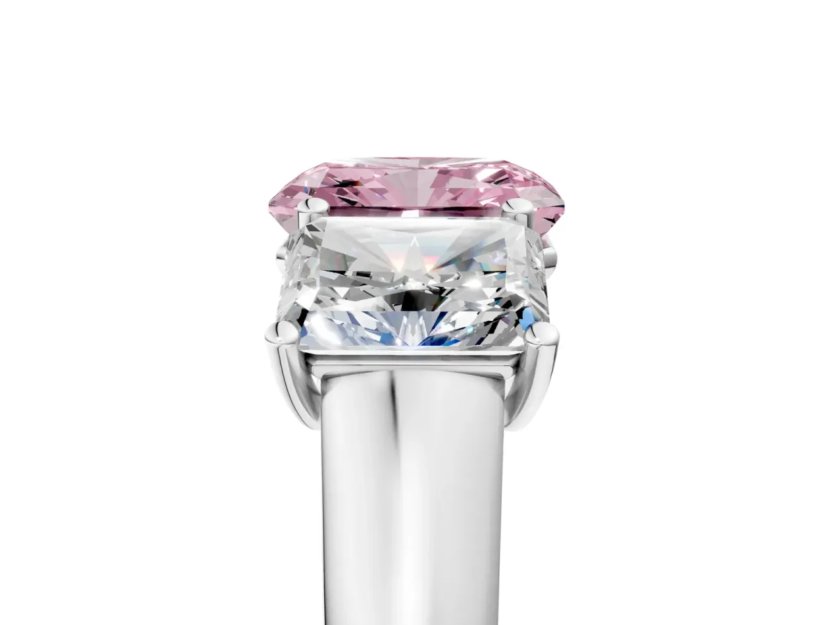 Fancy Pink Radiant Cut Three-Stone Diamond Ring with Prong Setting on a Classic Band Platinum
