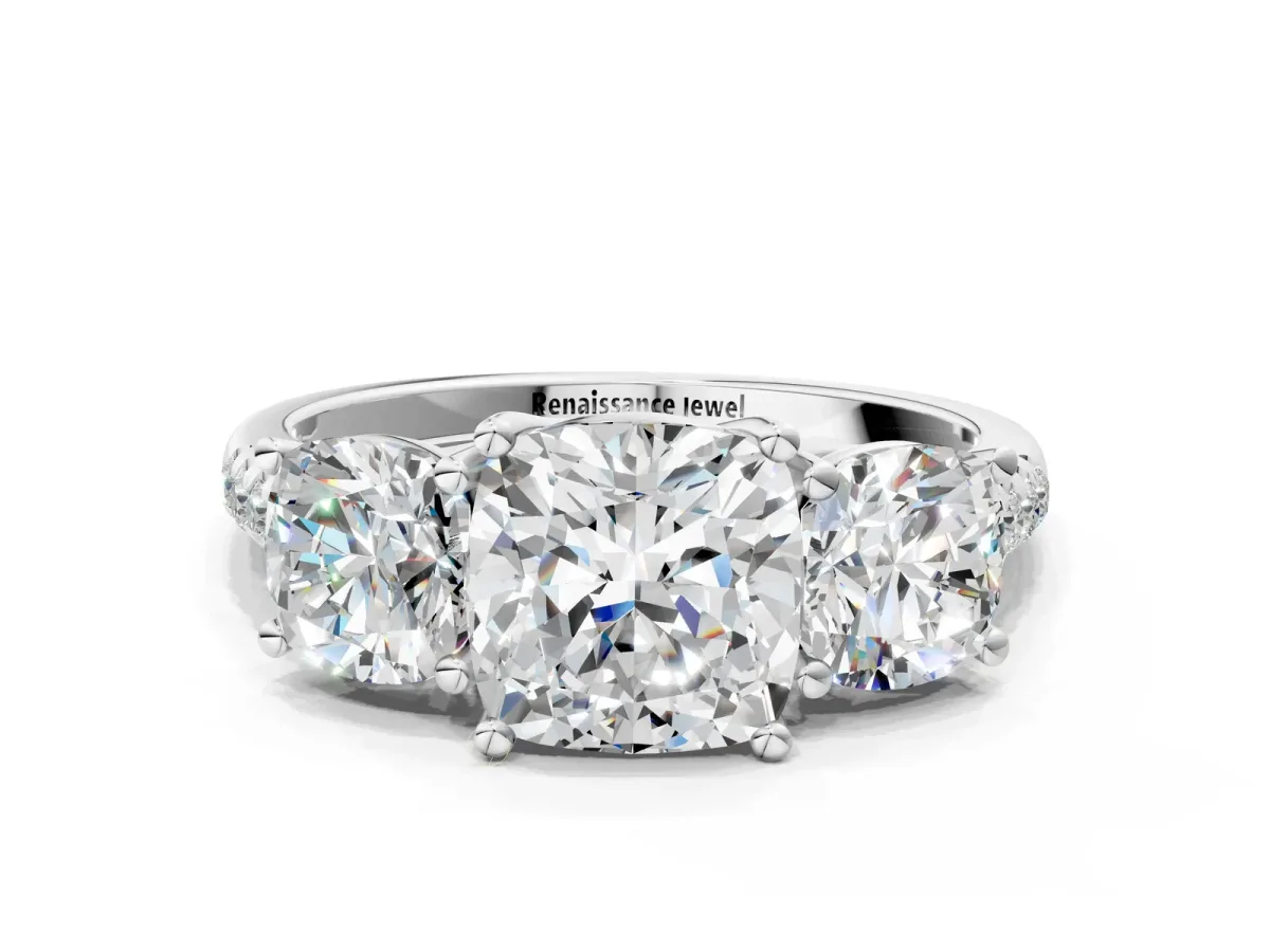 Three-Stone Cushion Cut Diamond Ring with Round Pavé Band and Prong Setting Platinum