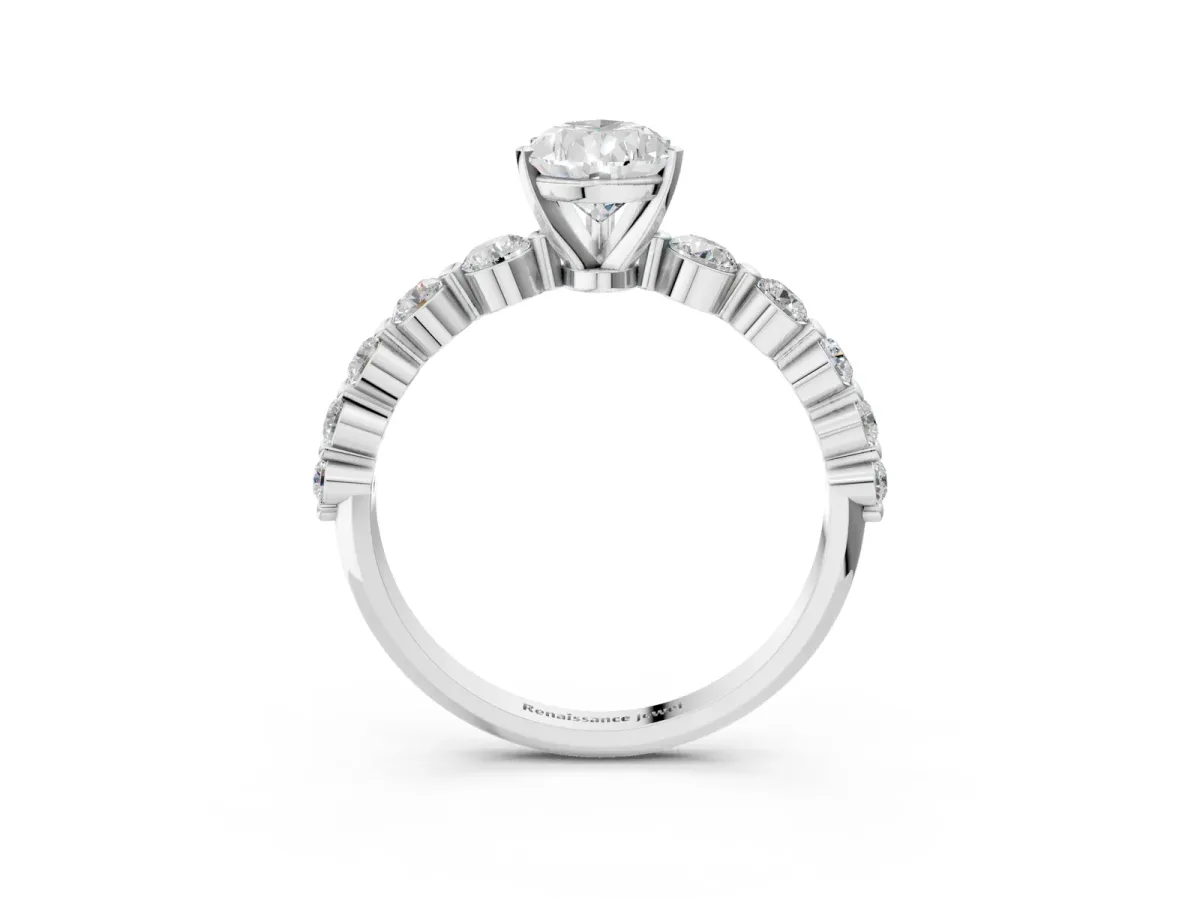 Pear Cut Solitaire Diamond Ring with Pave Band and Four-Prong Setting Platinum