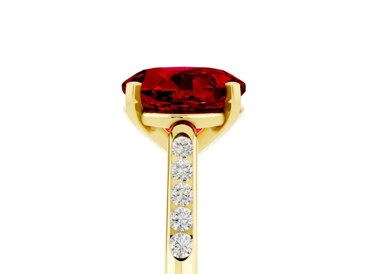 Round Cut Ruby Solitaire Ring with Channel Set Round Band and Prong Setting Yellow gold