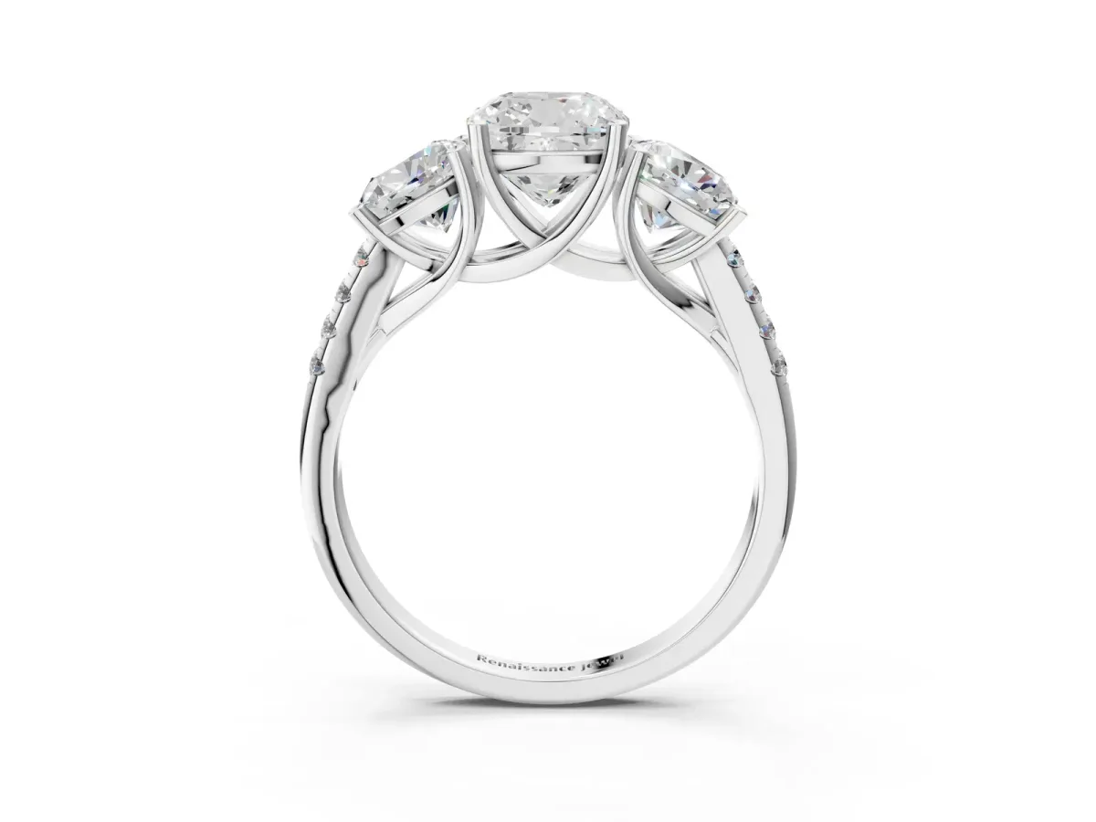 Three-Stone Cushion Cut Diamond Ring with Round Pavé Band and Prong Setting Platinum