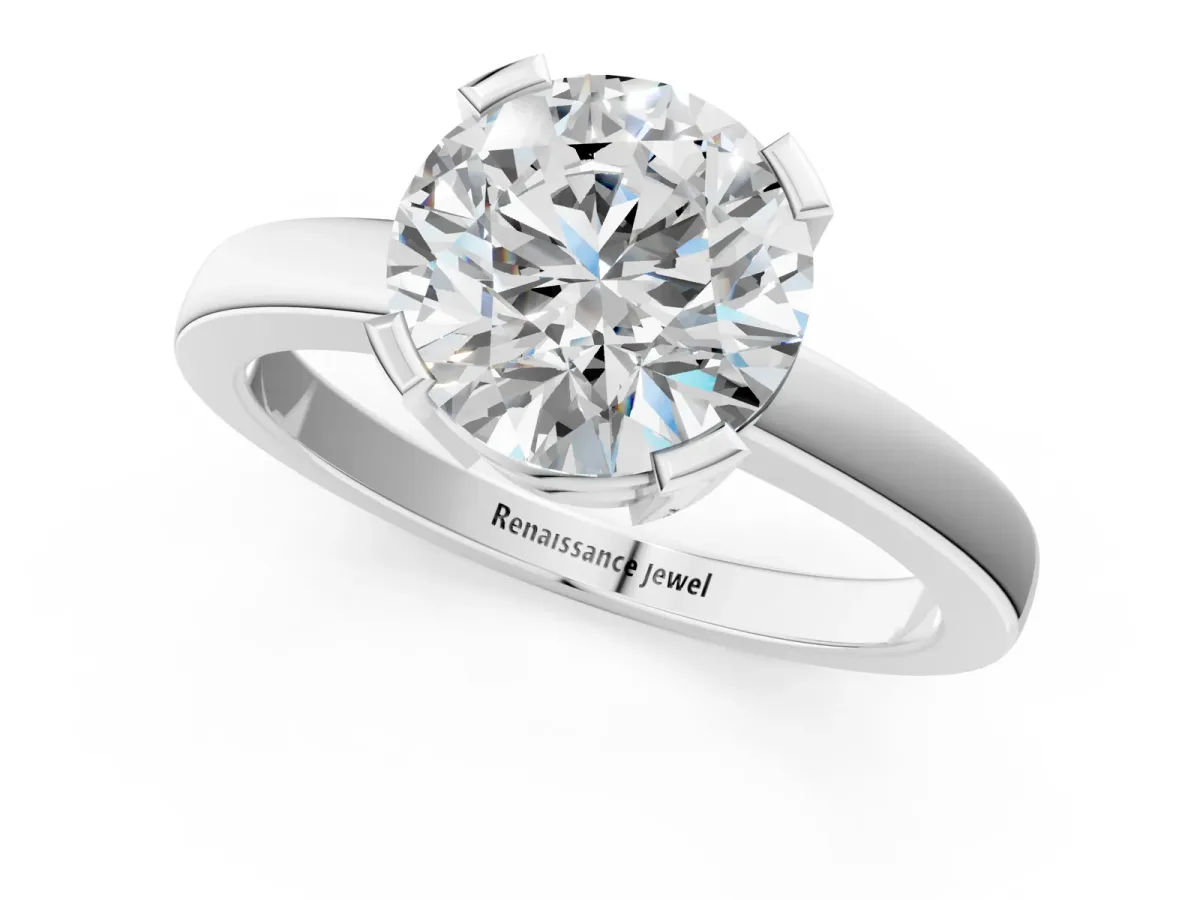 Round Cut Cut Solitaire Ring with Four-Prong Setting and Classic Band Silver