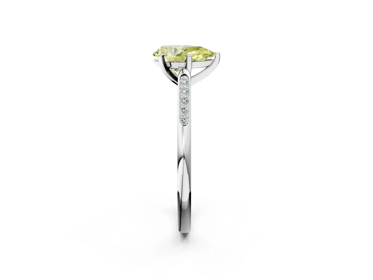 Fancy Yellow Pear Cut Diamond Solitaire Ring with Channel Set Round Band and Prong Setting Silver