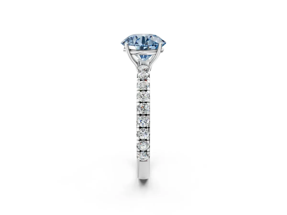 Fancy Blue Round Cut Diamond Pavé Solitaire Engagement Ring with Four-Prong Setting Silver