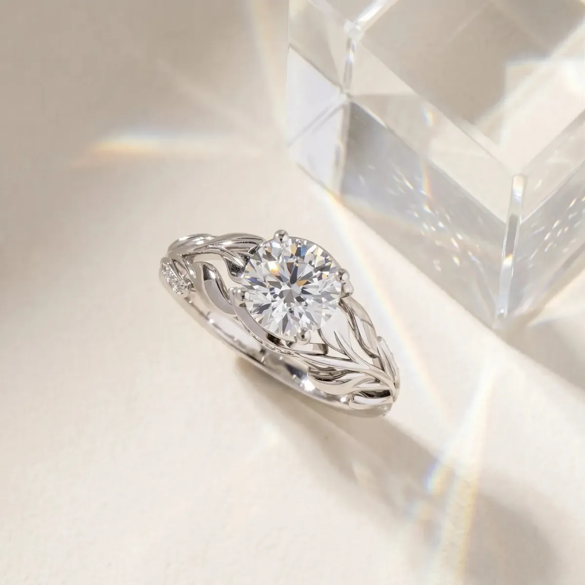 Round Cut Diamond Leaf-Inspired Engagement Ring with Round Accents and Prong Setting Silver