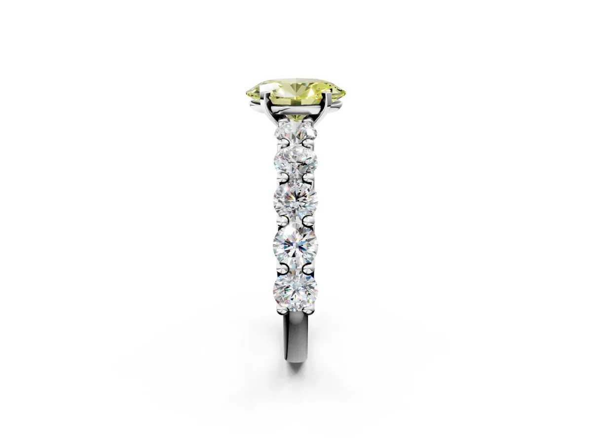 Fancy Yellow Oval Cut Diamond Prong Setting with Side Stones on a Pave Band Platinum