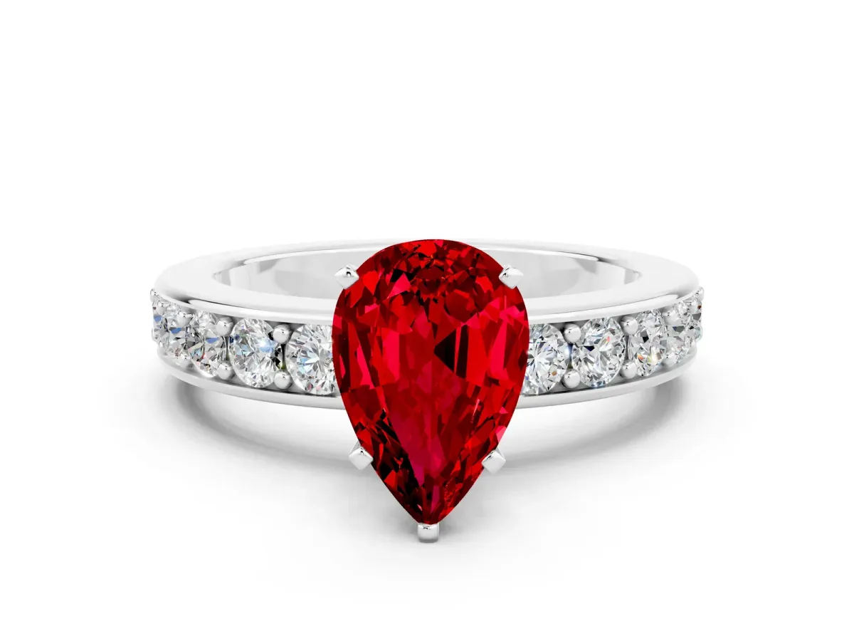 Pear Cut Ruby Engagement Ring with Channel Set Round Band and Prong Setting White gold
