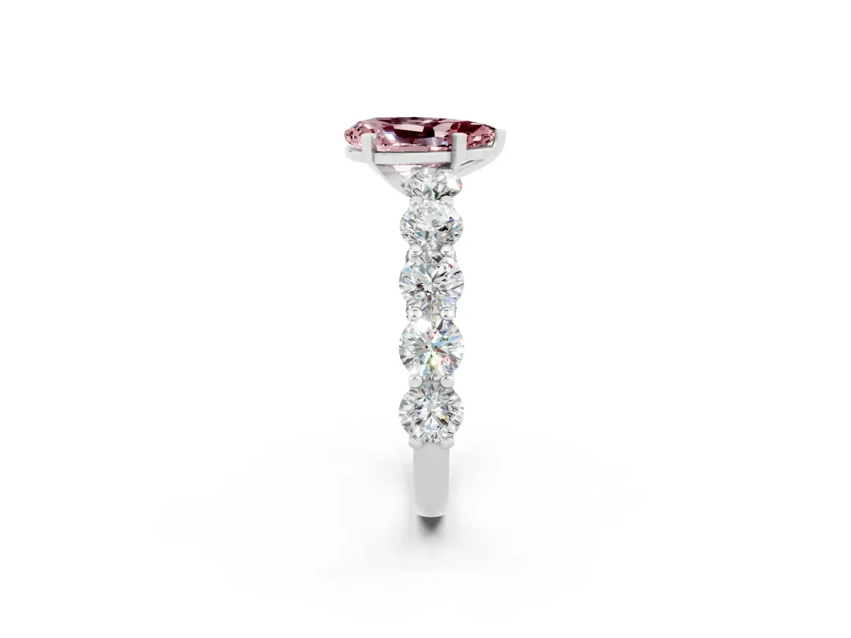 Pear Cut Morganite Prong Setting with Side Stones on a Pave Band Silver