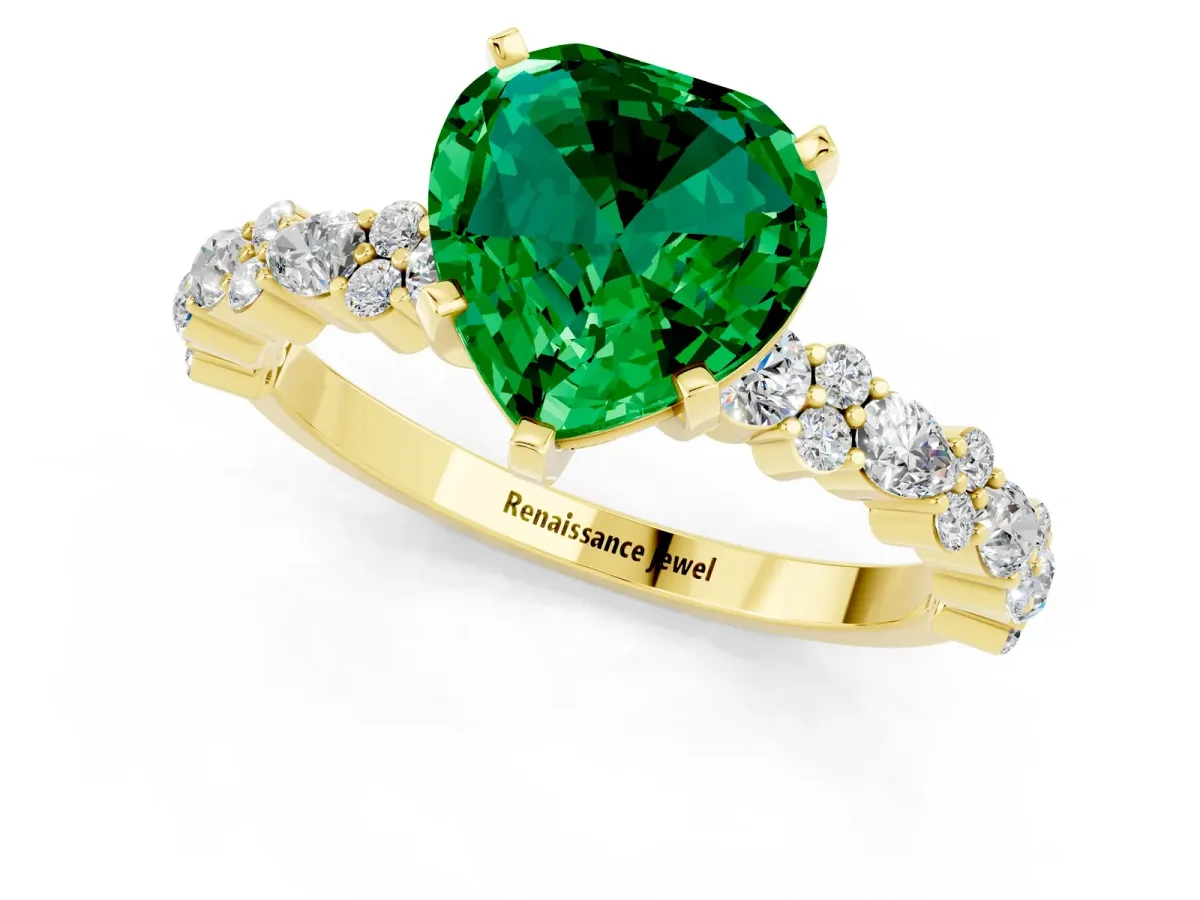 Heart Cut Emerald Side Stone Solitaire Ring with Round and Four-Prong Setting Yellow gold