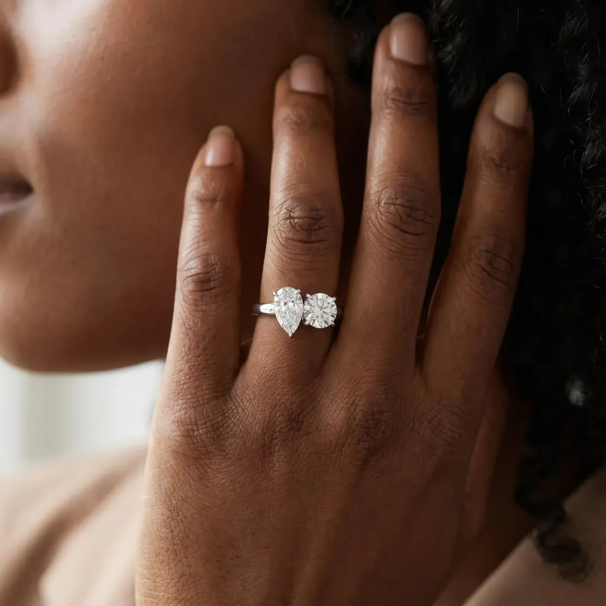 Round and Pear Toi Moi Ring with Prong Setting and Plain Band Platinum