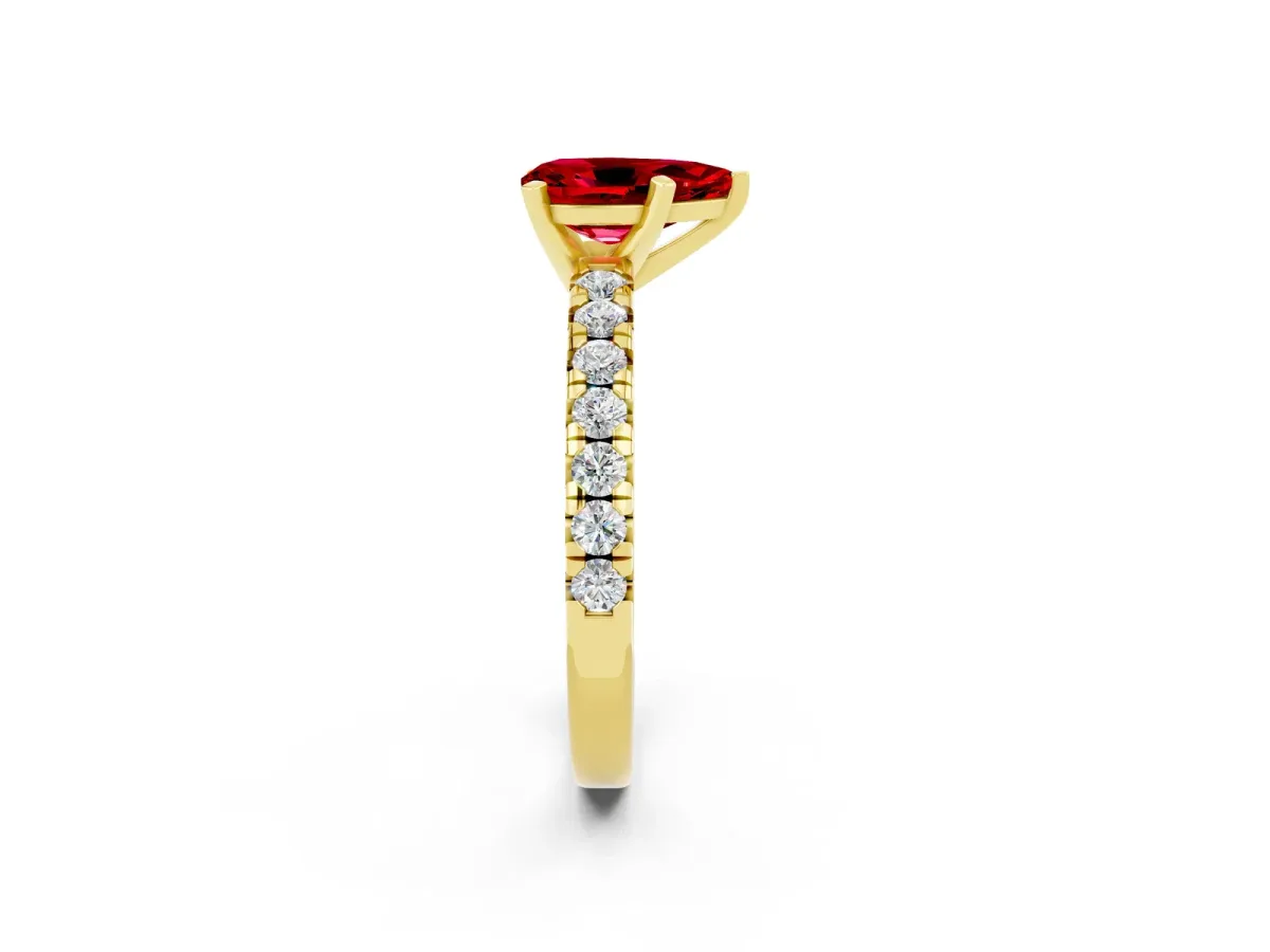 Pear Cut Ruby Solitaire Pavé Engagement Ring with Round Band and Prong Setting Yellow gold