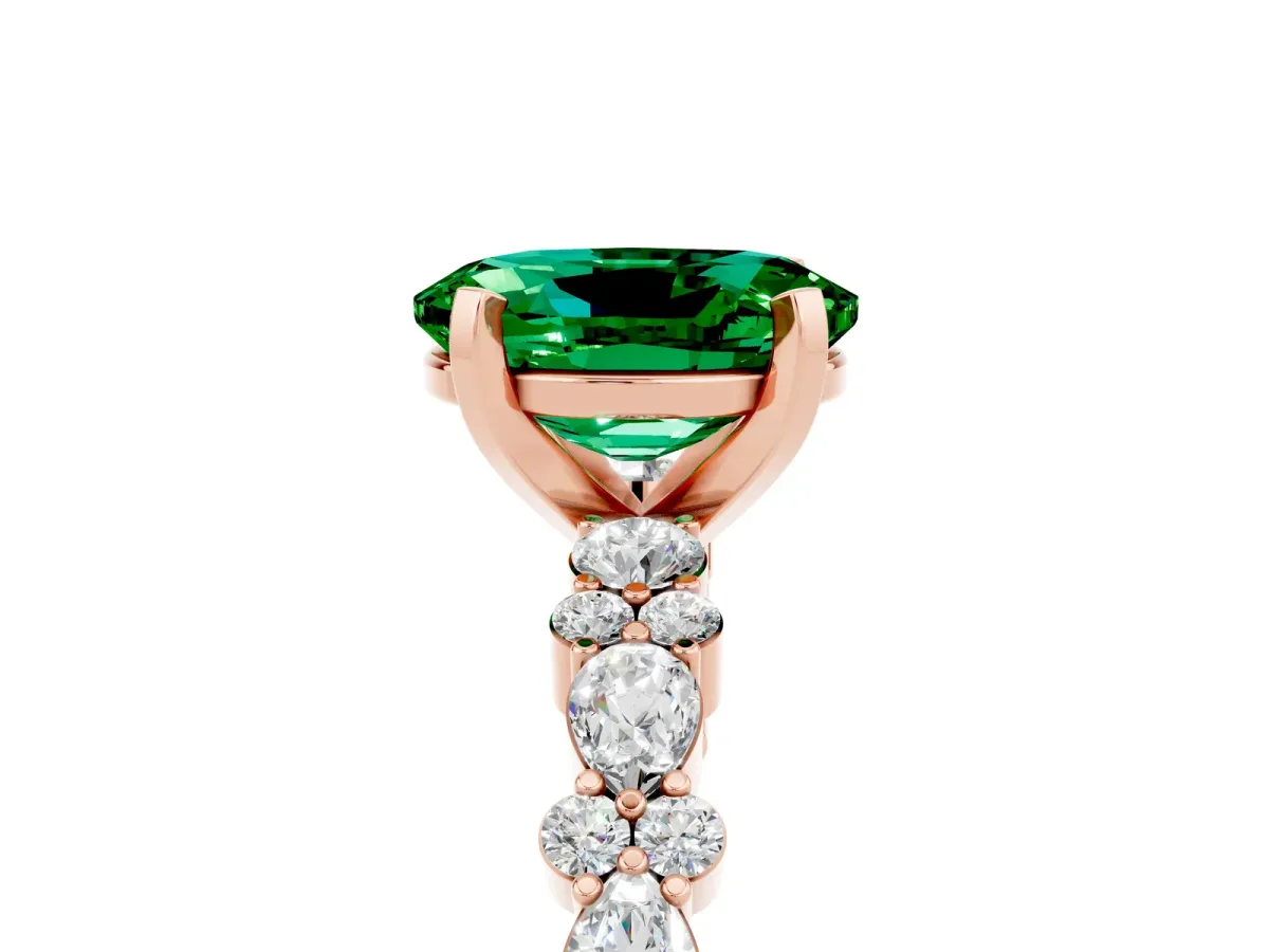 Oval Cut Emerald Side Stone Solitaire Ring with Round and Four-Prong Setting Rose gold