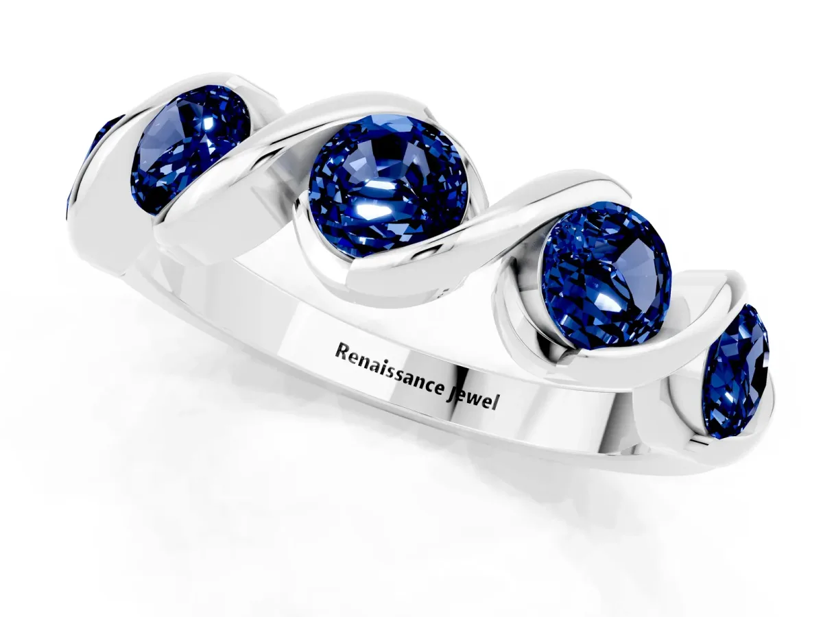 Round Blue Sapphire Wave Band with Channel Setting and Shared Prongs White gold