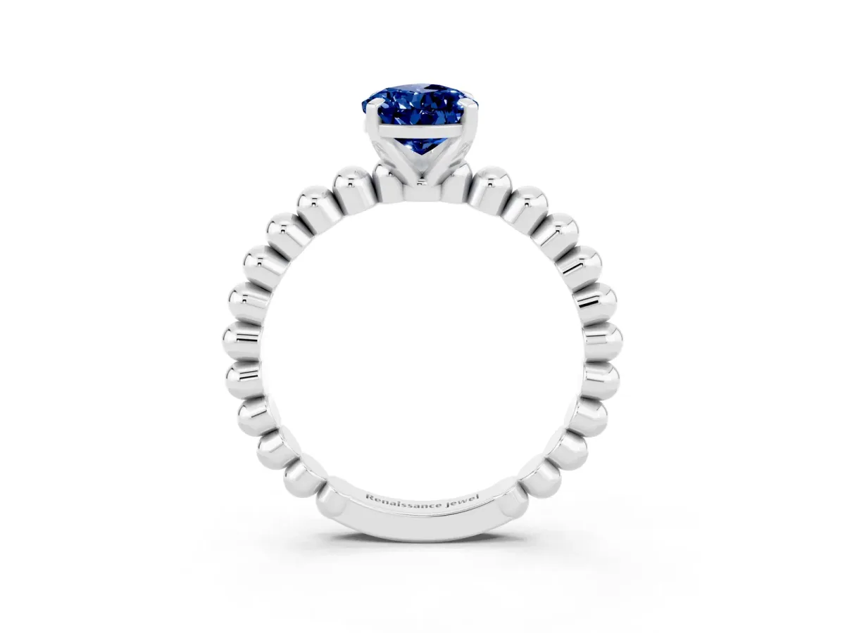 Pear Cut Blue Sapphire Solitaire Ring with Beaded Band and Prong Setting Silver