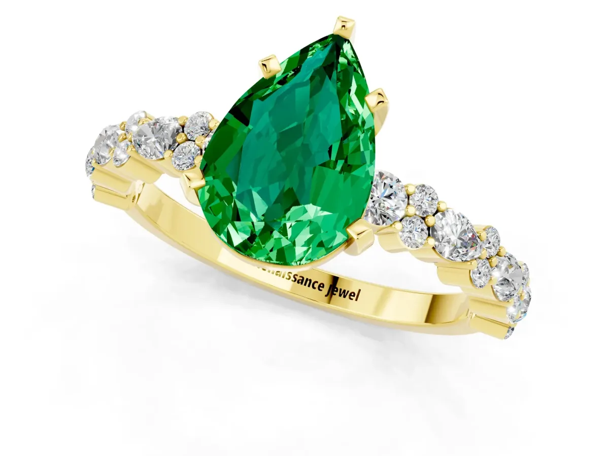 Pear Cut Emerald Side Stone Solitaire Ring with Round and Four-Prong Setting Yellow gold