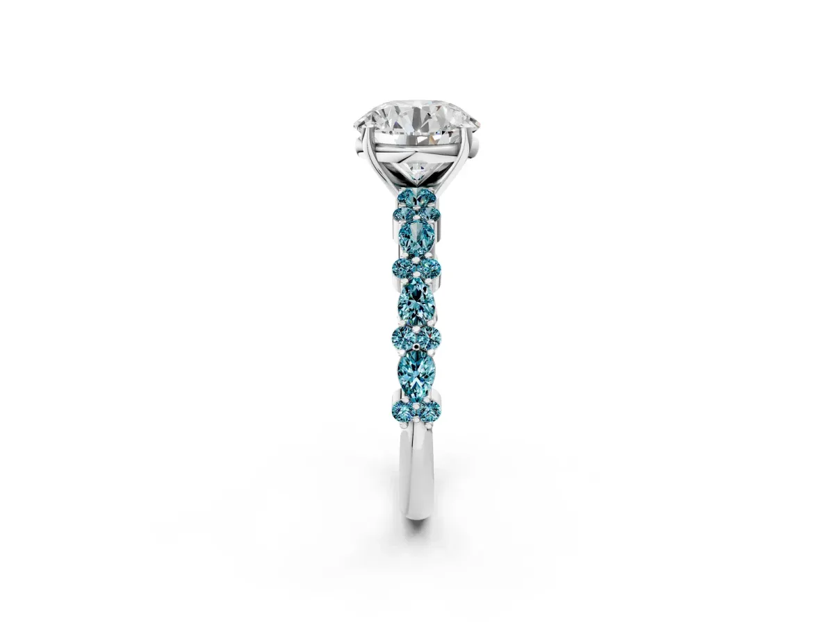 Round Cut Diamond Side Stone Solitaire Ring with Round Blue Topaz and Four-Prong Setting Silver