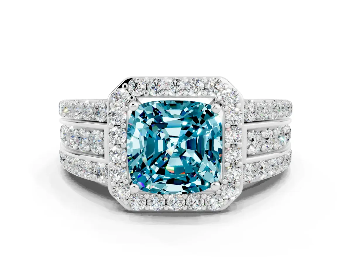 Cushion Cut Halo Blue Topaz Ring with Round Split Shank and Prong Setting Platinum