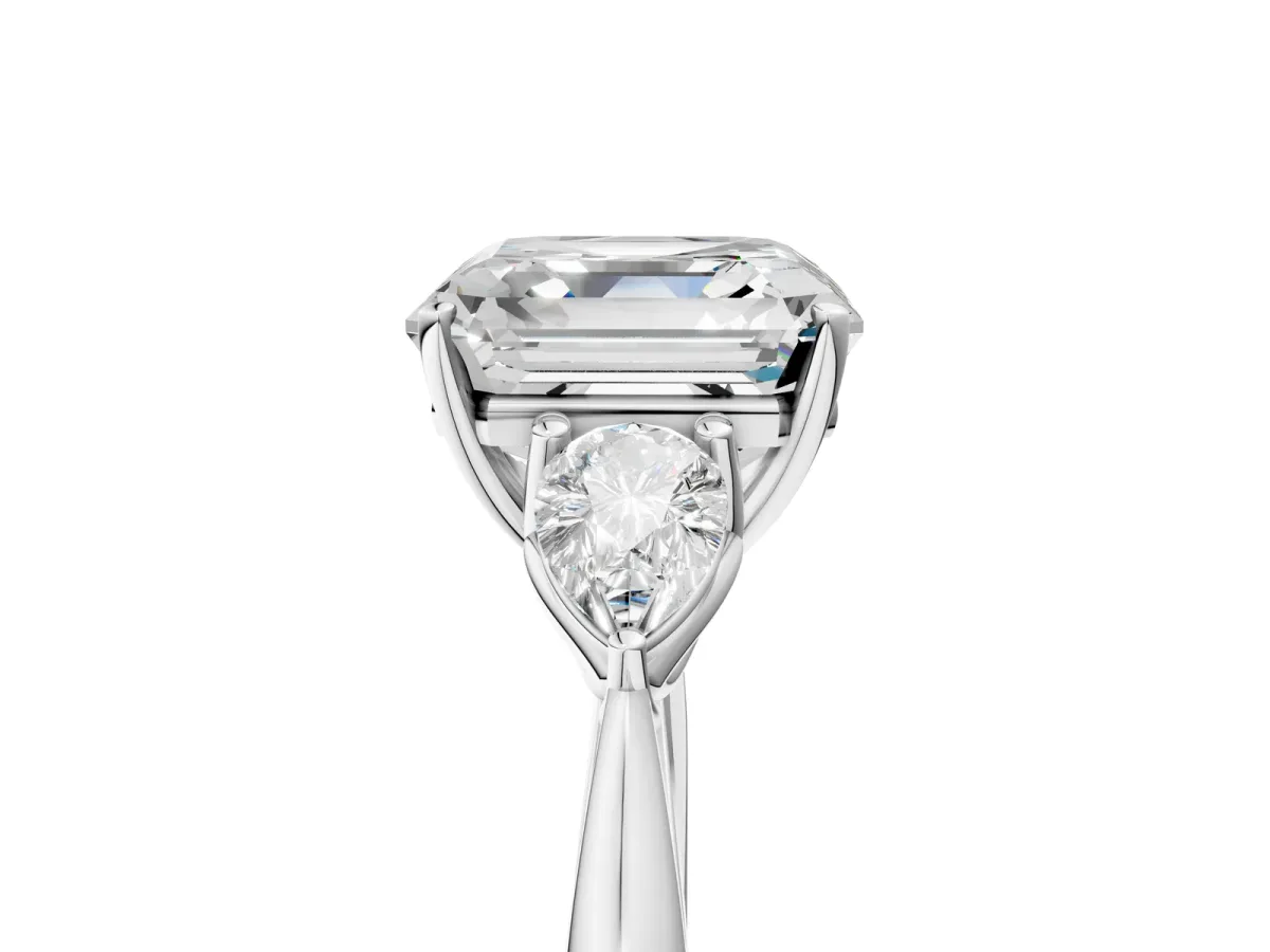 Three-Stone Asscher Cut Diamond Ring with Pear Side Stones in Four-Prong Setting Platinum