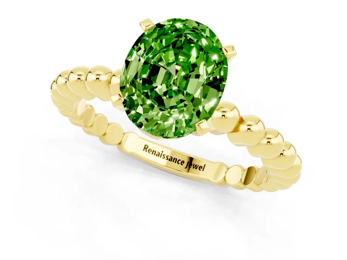 Oval Cut Peridot Solitaire Ring with Beaded Band and Prong Setting Yellow gold