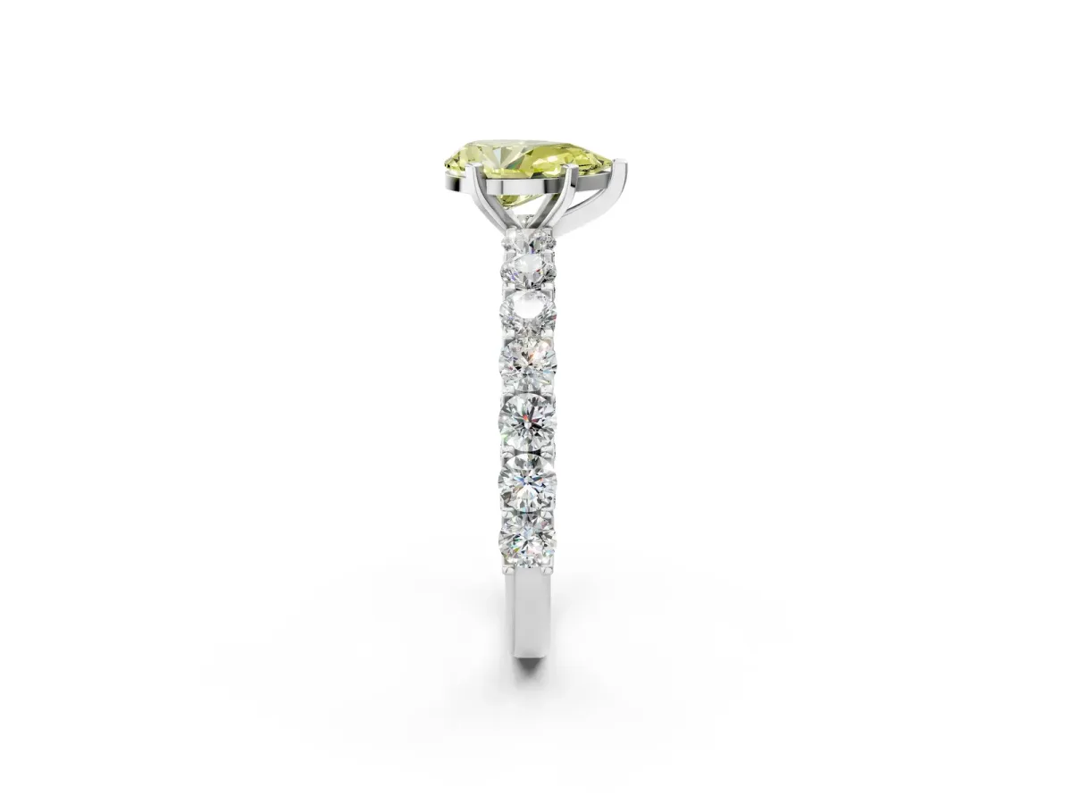 Fancy Yellow Pear Cut Diamond Solitaire Ring with Shared Prong Pavé Band and Four-Prong Setting Silver