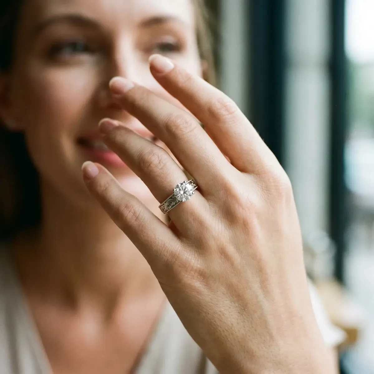 Round Cut Diamond Solitaire Ring with Engraved Band and Four-Prong Setting White gold