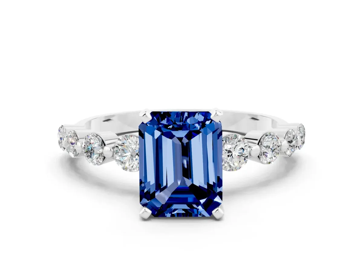 Emerald Cut Solitaire Blue Sapphire Ring with Pave Band and Four-Prong Setting Silver