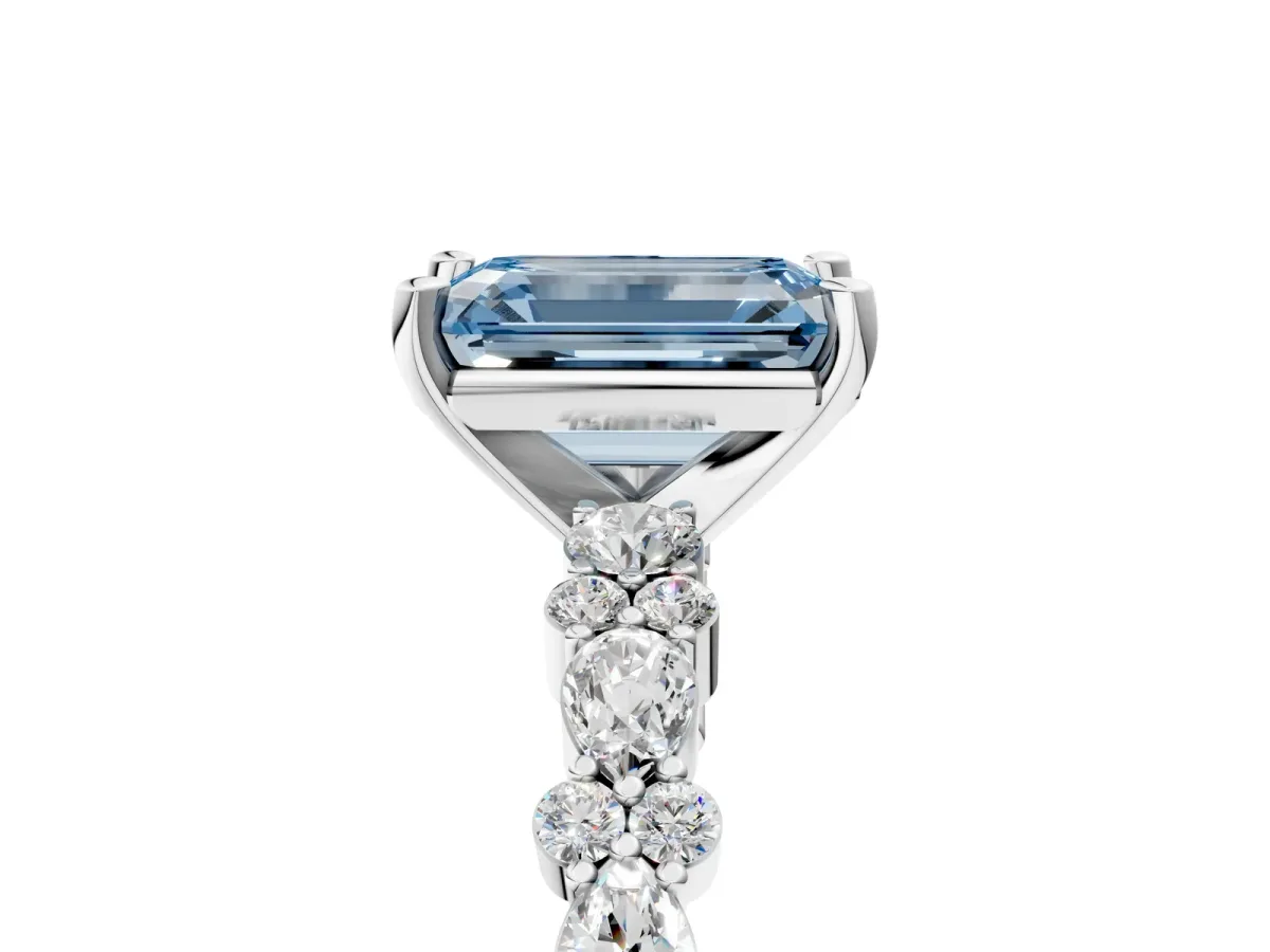 Fancy Blue Emerald Cut Diamond Side Stone Solitaire Ring with Round and Four-Prong Setting Platinum