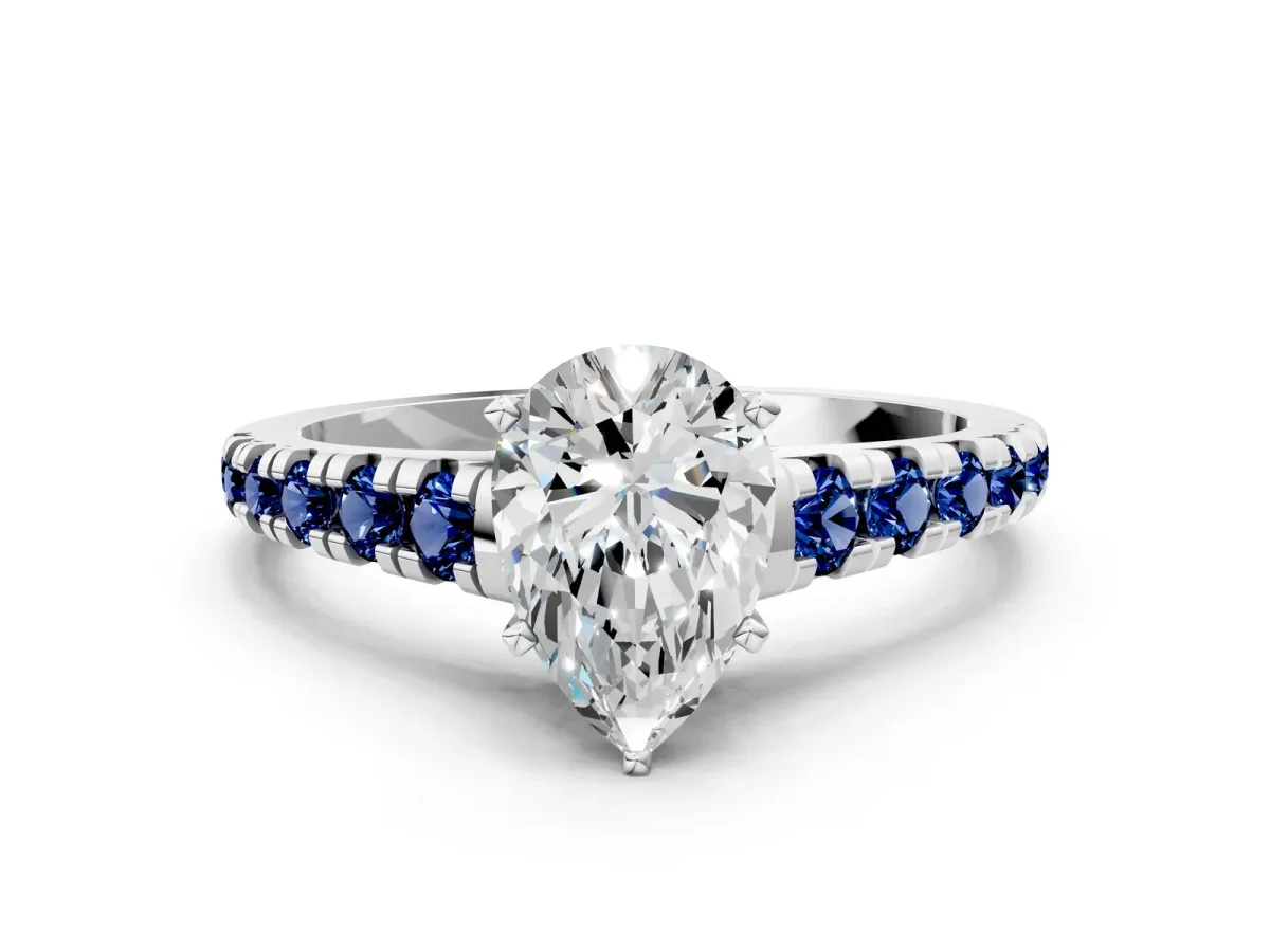 Pear Cut Diamond Cathedral Solitaire Ring with Round Blue Sapphire Pavé Band Silver