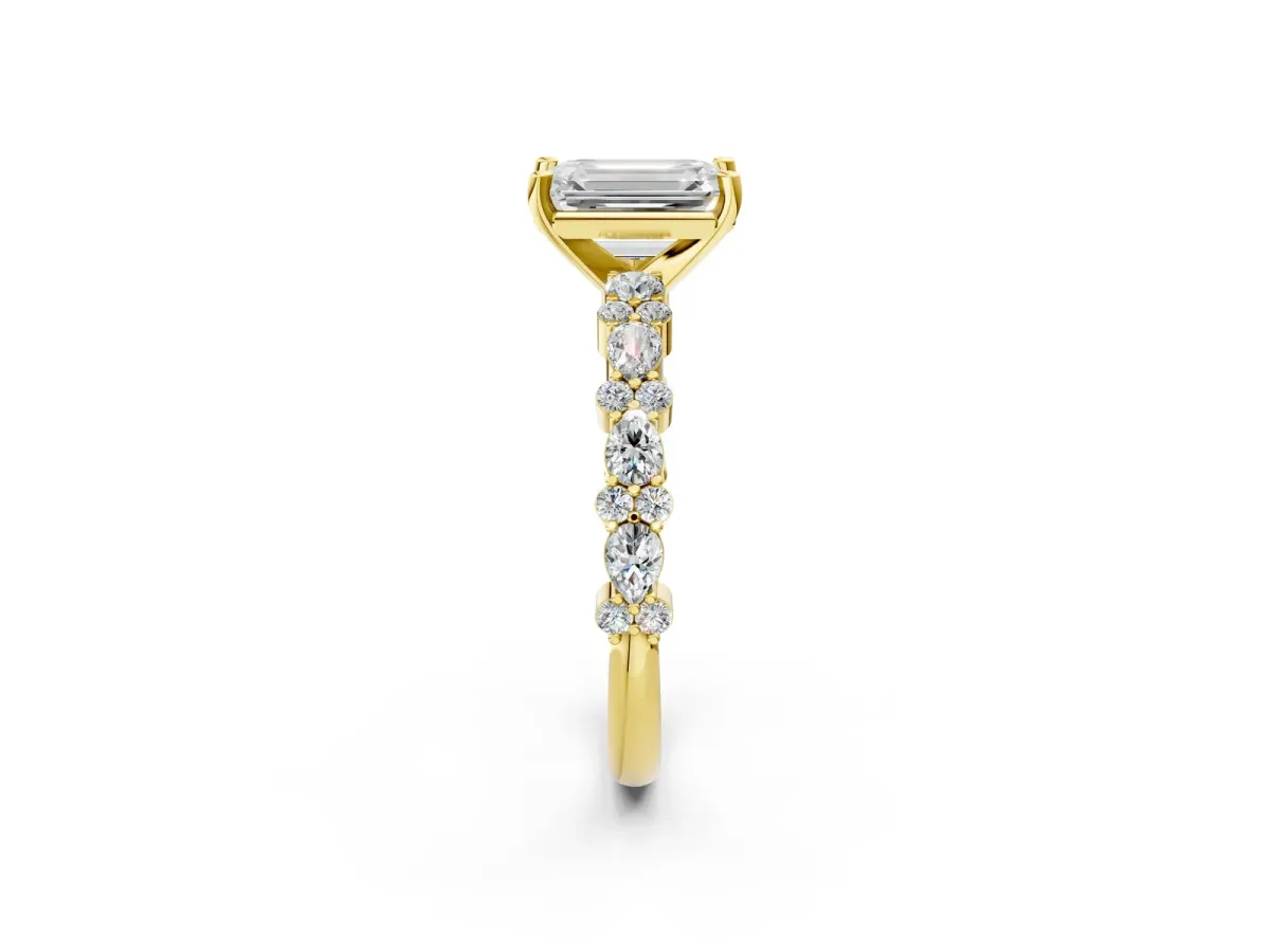 Emerald Cut Diamond Side Stone Solitaire Ring with Round and Four-Prong Setting Yellow gold