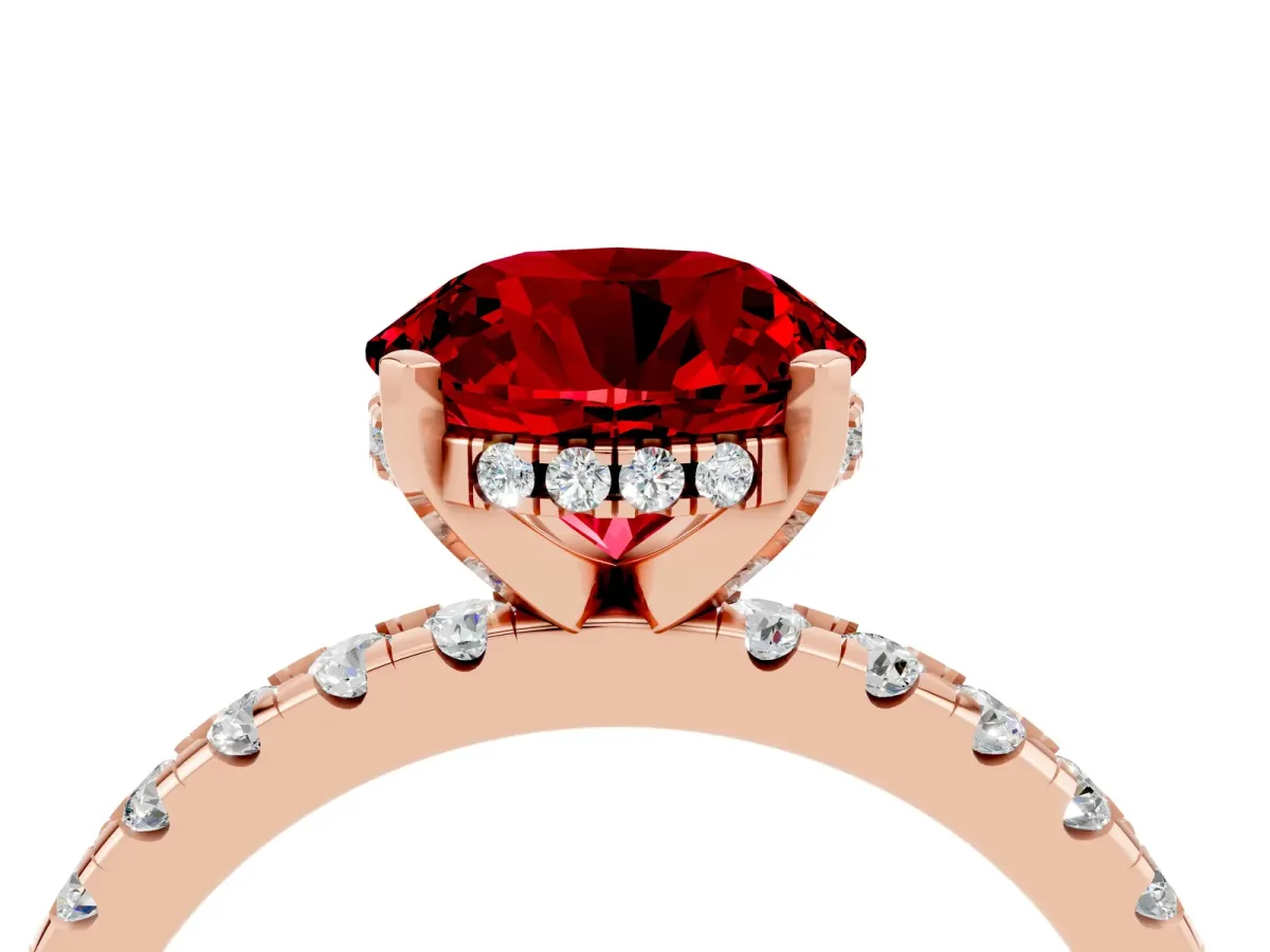 Round Cut Ruby Solitaire Ring with Round Pavé Band and Four-Prong Setting Rose gold