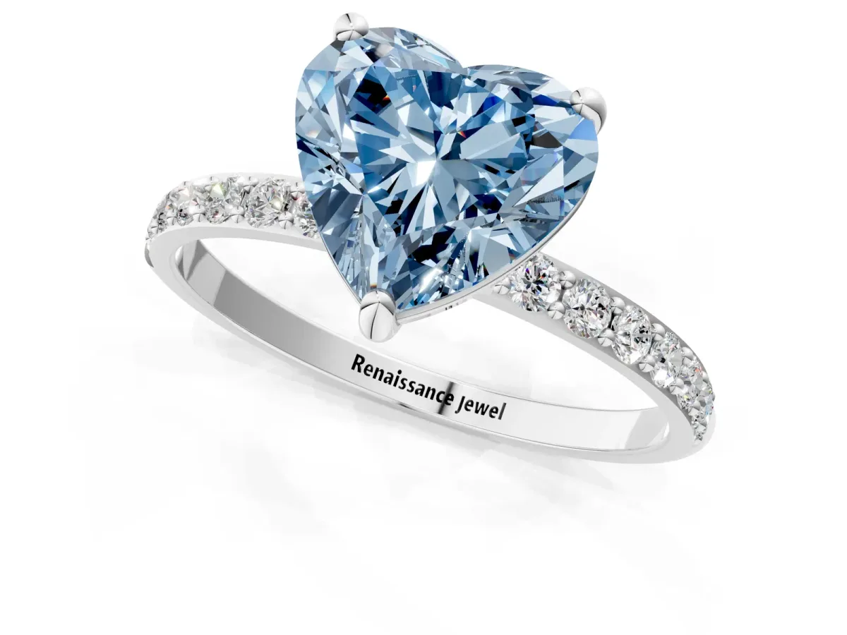 Fancy Blue Heart Cut Diamond Solitaire Ring with Round Pavé Band and Prong Setting Silver