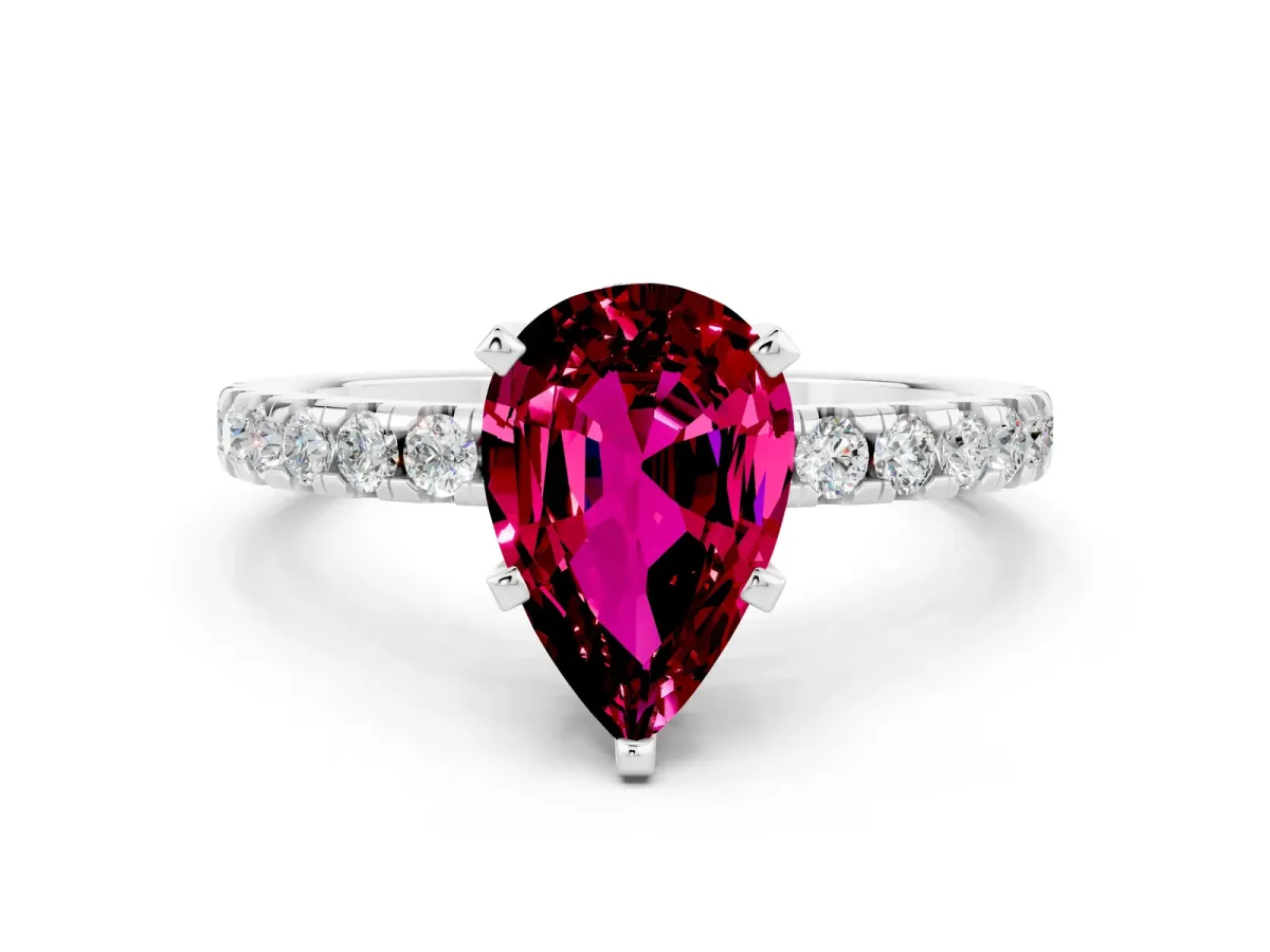 Pear Cut Garnet Solitaire Ring with Round Pavé Band and Four-Prong Setting Silver
