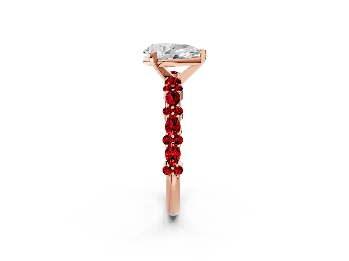 Pear Cut Diamond Side Stone Solitaire Ring with Round Ruby and Four-Prong Setting Rose gold