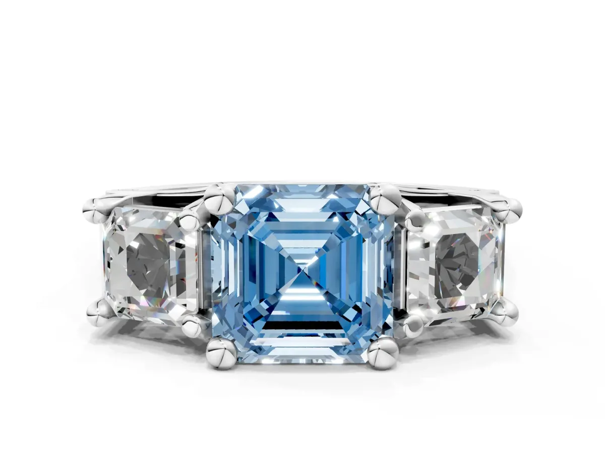 Fancy Blue Asscher Cut Diamond Three-Stone Ring with Channel Set Band and Four-Prong Setting Platinum